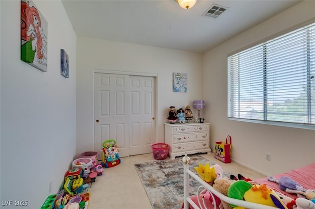 playroom with carpet floors and plenty of natural light