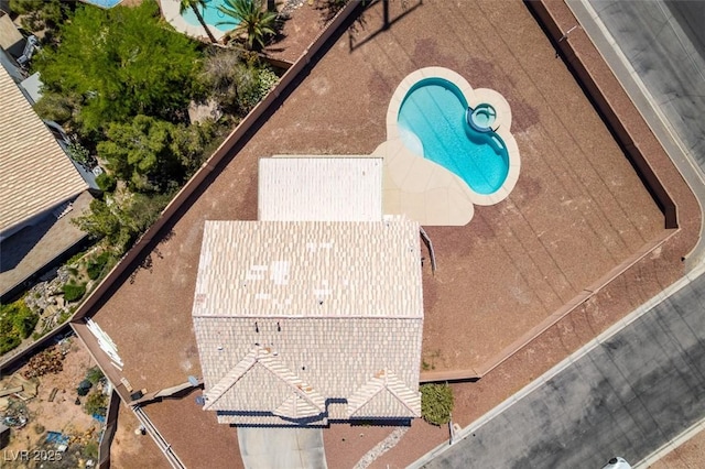 view from above of property featuring a pool
