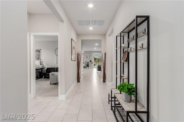 5741 N Park St, Las Vegas, NV 89149 - corridor featuring light tile patterned floors, visible vents, baseboards, and recessed lighting