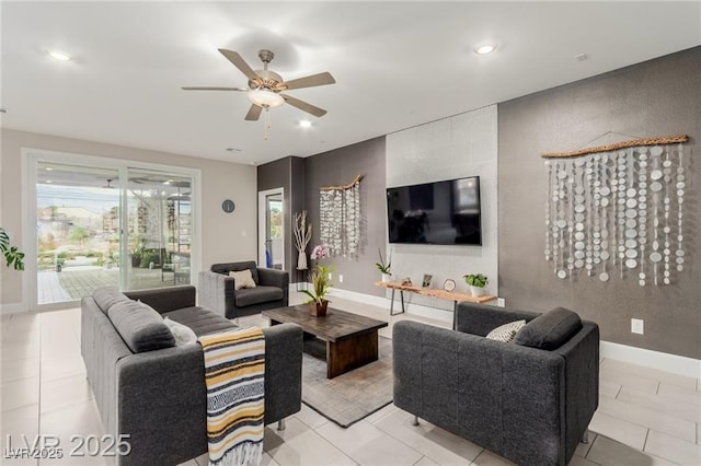 5741 N Park St, Las Vegas, NV 89149 - living area with recessed lighting, a ceiling fan, and an accent wall