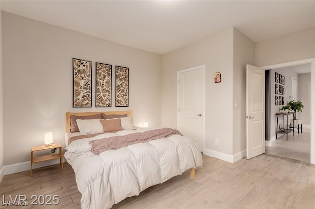 5741 N Park St, Las Vegas, NV 89149 - bedroom with light wood-type flooring and baseboards