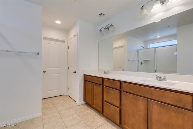 528 Sunny Pointe St, Henderson, NV 89011 - bathroom featuring an enclosed shower, tile patterned flooring, double vanity, baseboards, and recessed lighting