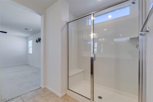528 Sunny Pointe St, Henderson, NV 89011 - full bathroom with a stall shower, tile patterned floors, and baseboards