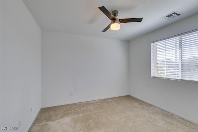 528 Sunny Pointe St, Henderson, NV 89011 - empty room featuring light carpet, a ceiling fan, and baseboards