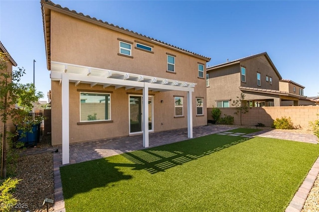 528 Sunny Pointe St, Henderson, NV 89011 - rear view of property featuring stucco siding, a pergola, and a patio