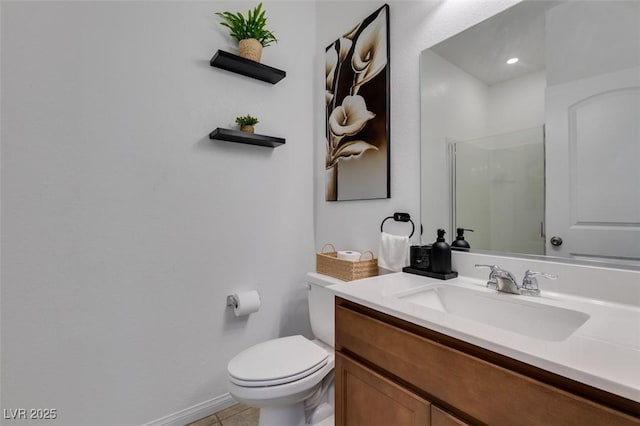 528 Sunny Pointe St, Henderson, NV 89011 - full bath with a shower with shower door, toilet, vanity, tile patterned flooring, and baseboards