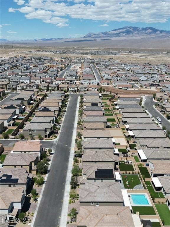 8724 Scalpay St, Las Vegas, NV 89166 - aerial overview of property's location with mountains and nearby suburban area