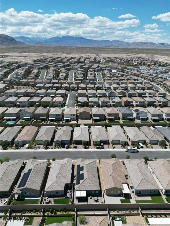 8724 Scalpay St, Las Vegas, NV 89166 - aerial view of residential area featuring a mountainous background