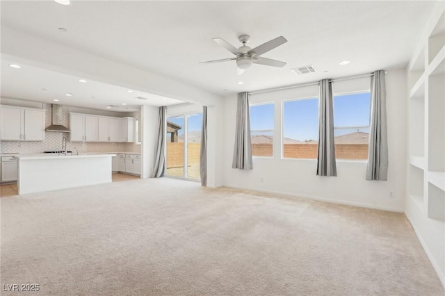 8724 Scalpay St, Las Vegas, NV 89166 - unfurnished living room with recessed lighting, ceiling fan, light colored carpet, and baseboards