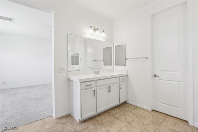 8724 Scalpay St, Las Vegas, NV 89166 - bathroom with vanity, tile patterned flooring, and baseboards