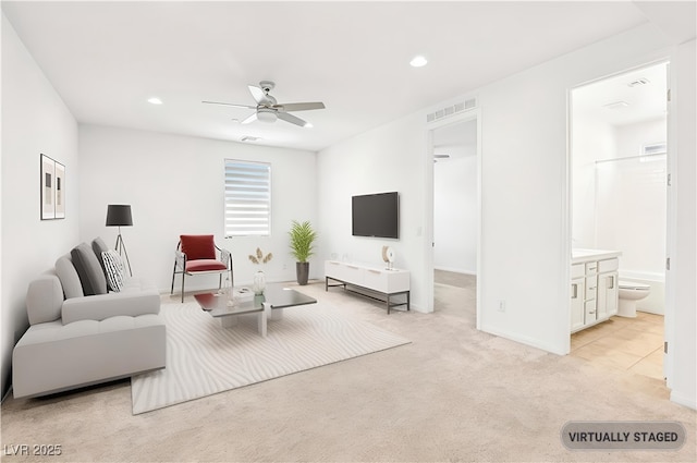 8724 Scalpay St, Las Vegas, NV 89166 - living area with ceiling fan, light colored carpet, recessed lighting, and baseboards
