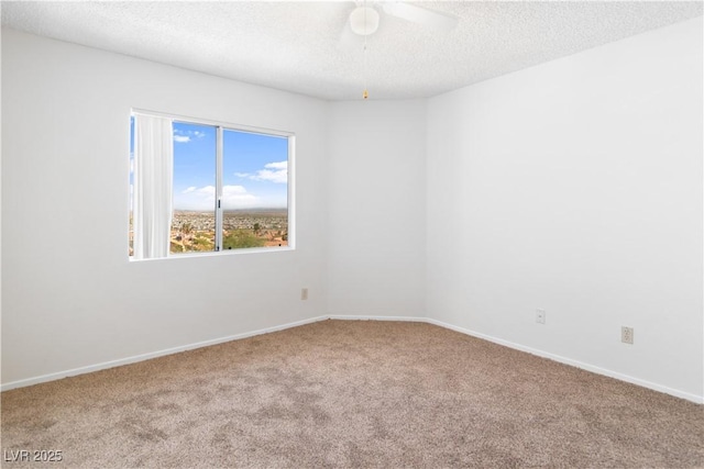 2191 Bay Club Dr Unit 204, Laughlin, NV 89029 - carpeted spare room with a textured ceiling, baseboards, and ceiling fan