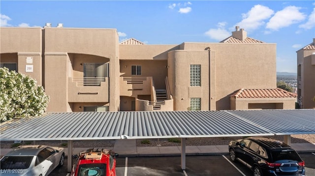 2191 Bay Club Dr Unit 204, Laughlin, NV 89029 - view of property featuring covered and uncovered parking
