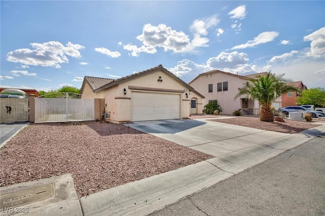 single story home with concrete driveway, stucco siding, a garage, and a gate