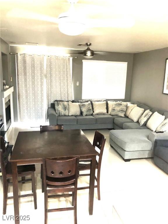 6030 Halehaven Dr, Las Vegas, NV 89110 - living area with a ceiling fan