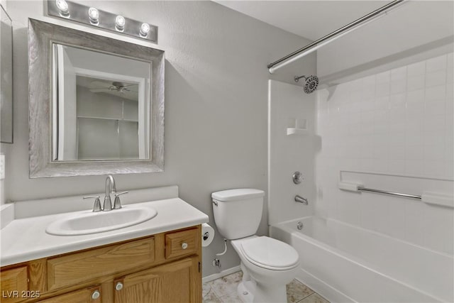 full bath with vanity, toilet, shower / bathtub combination, and a ceiling fan