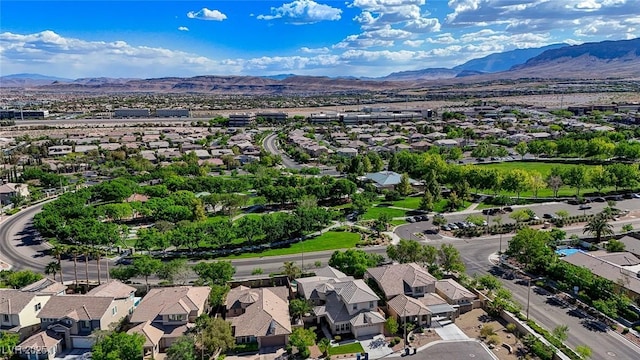 aerial view with a mountain view and a residential view