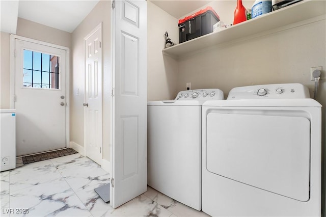 5939 Vegas Dr, Las Vegas, NV 89108 - laundry room with marble finish floor, laundry area, and separate washer and dryer