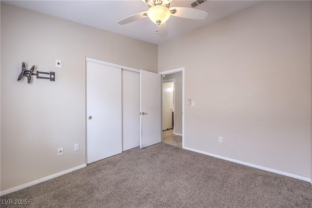 8136 Shady Glen Ave, Las Vegas, NV 89131 - unfurnished bedroom with carpet, a closet, and a ceiling fan