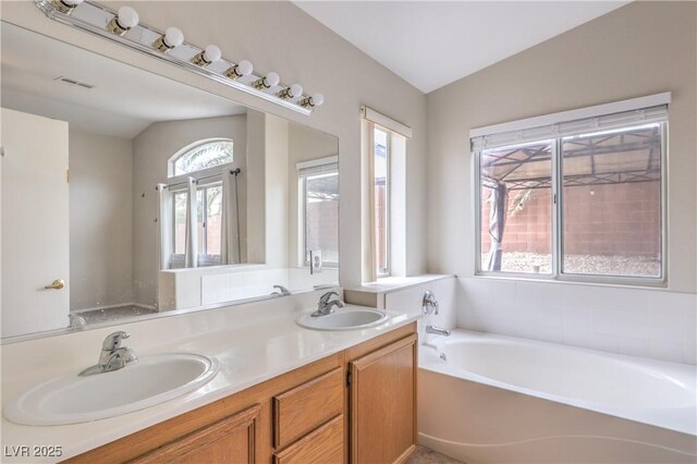 8136 Shady Glen Ave, Las Vegas, NV 89131 - full bathroom with a garden tub and double vanity