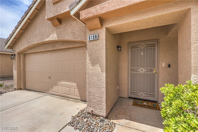 8136 Shady Glen Ave, Las Vegas, NV 89131 - property entrance featuring stucco siding and a garage