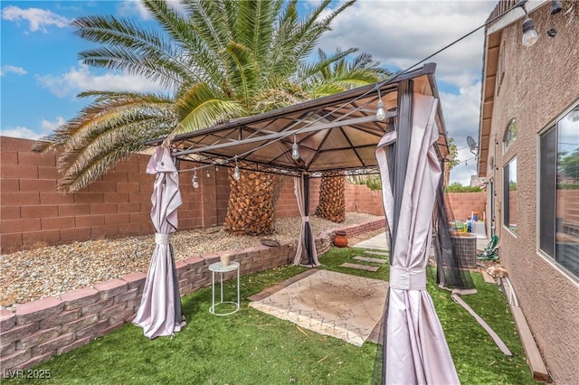 8136 Shady Glen Ave, Las Vegas, NV 89131 - fenced backyard with a patio and a gazebo