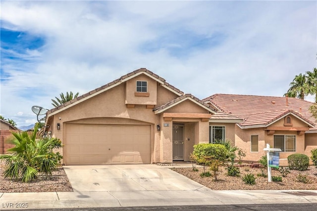 8136 Shady Glen Ave, Las Vegas, NV 89131 - view of front facade with concrete driveway, stucco siding, a garage, and a tile roof