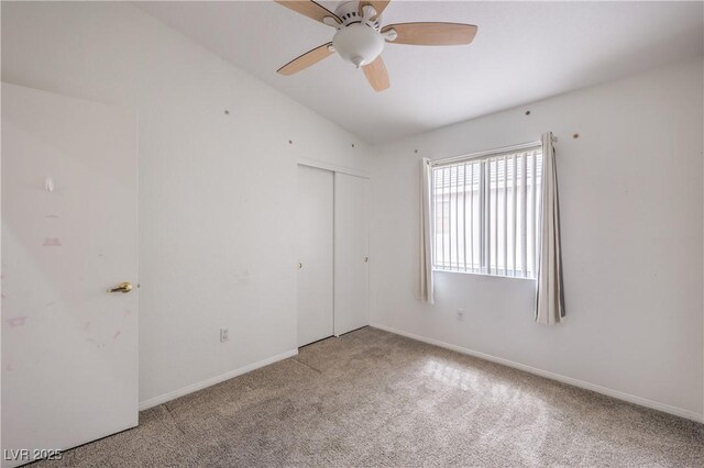 8136 Shady Glen Ave, Las Vegas, NV 89131 - unfurnished bedroom featuring carpet, a closet, a ceiling fan, and lofted ceiling
