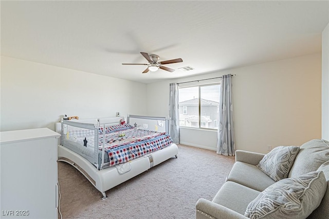 bedroom with light colored carpet, visible vents, baseboards, and ceiling fan