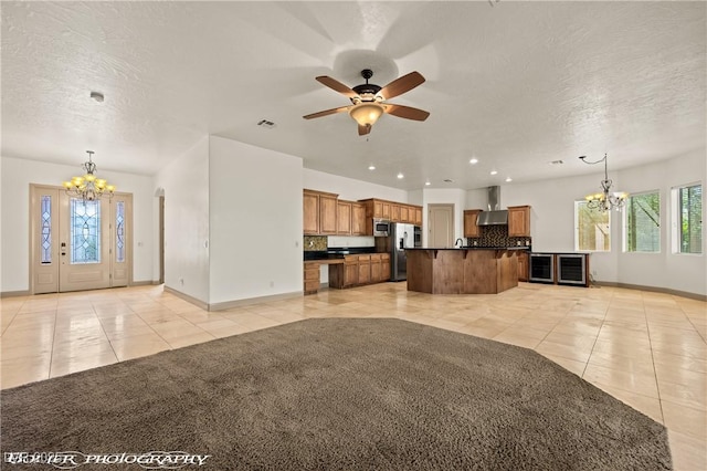 653 Paloma Cir, Mesquite, NV 89027 - unfurnished living room featuring a wealth of natural light, light tile patterned floors, and baseboards