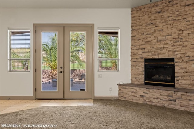 653 Paloma Cir, Mesquite, NV 89027 - doorway with french doors, tile patterned flooring, and carpet floors