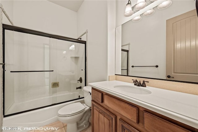 653 Paloma Cir, Mesquite, NV 89027 - full bathroom with toilet, tile patterned floors, vanity, and combined bath / shower with glass door