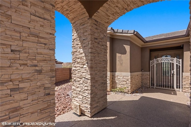 653 Paloma Cir, Mesquite, NV 89027 - view of patio featuring a gate and fence