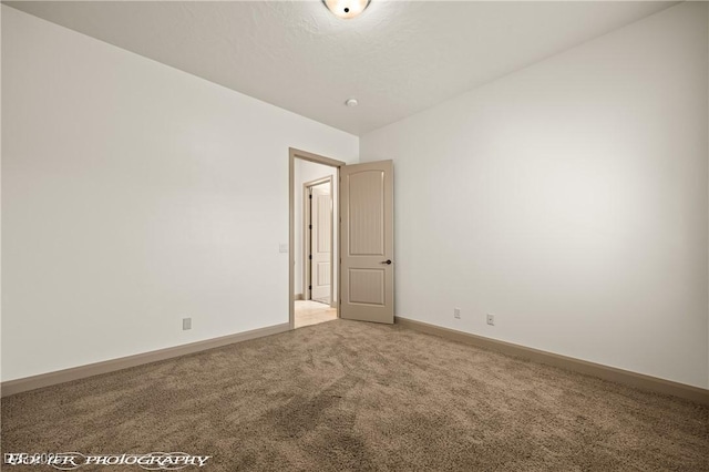 653 Paloma Cir, Mesquite, NV 89027 - empty room with baseboards and light colored carpet