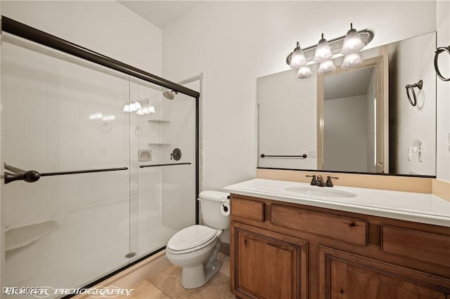 653 Paloma Cir, Mesquite, NV 89027 - bathroom with vanity, toilet, a shower stall, and tile patterned flooring