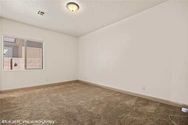 653 Paloma Cir, Mesquite, NV 89027 - carpeted empty room featuring baseboards and visible vents