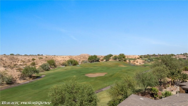 653 Paloma Cir, Mesquite, NV 89027 - view of home's community featuring a yard and view of golf course