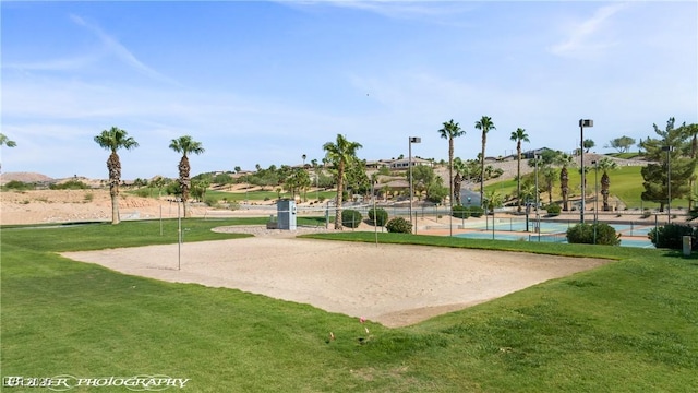 653 Paloma Cir, Mesquite, NV 89027 - surrounding community with volleyball court and a lawn