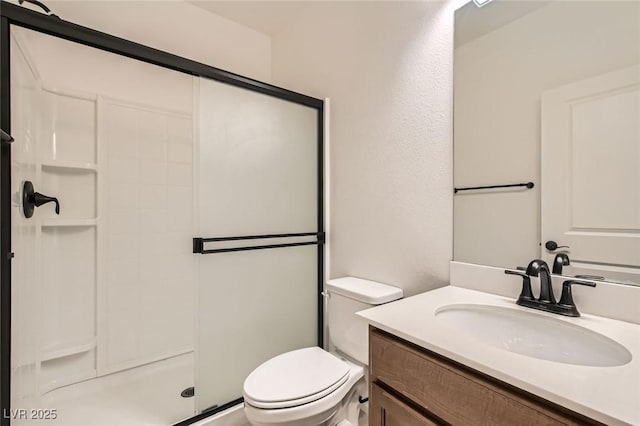 632 Cadence Vista Dr, Henderson, NV 89011 - full bathroom featuring a stall shower, vanity, and toilet