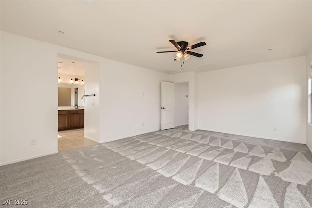 632 Cadence Vista Dr, Henderson, NV 89011 - unfurnished room featuring light carpet, a ceiling fan, and baseboards