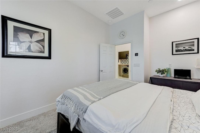 carpeted bedroom featuring baseboards, high vaulted ceiling, washer / dryer, and visible vents