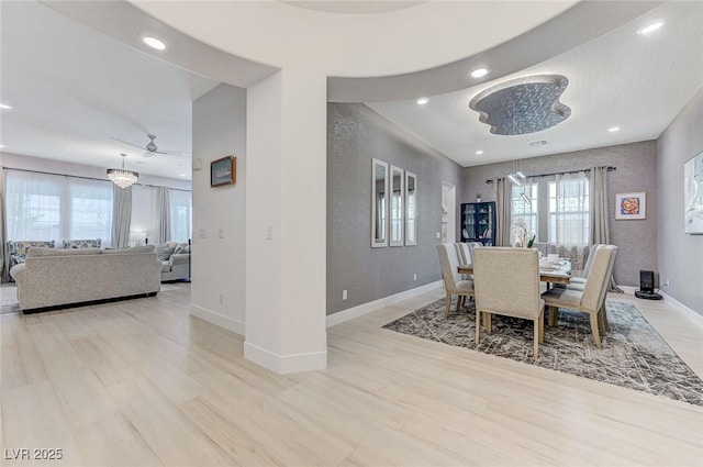 dining space with light wood-style floors, baseboards, ceiling fan, and recessed lighting