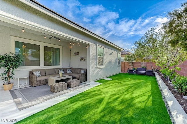 view of yard with a fenced backyard, an outdoor hangout area, and a patio area