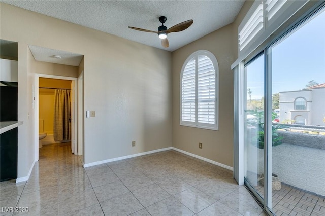 3150 Soft Breezes Dr Unit 2030, Las Vegas, NV 89128 - unfurnished room with ceiling fan, a textured ceiling, baseboards, and light tile patterned floors