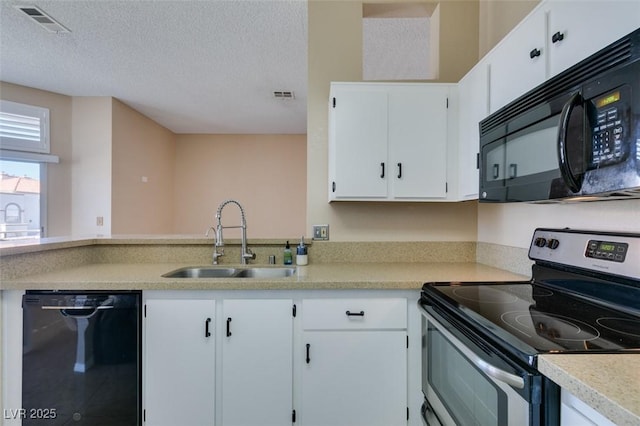 3150 Soft Breezes Dr Unit 2030, Las Vegas, NV 89128 - kitchen featuring black appliances, light countertops, visible vents, and a sink
