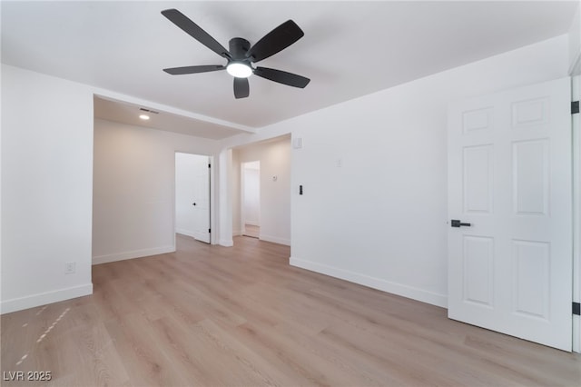 spare room with visible vents, recessed lighting, ceiling fan, baseboards, and light wood-style floors