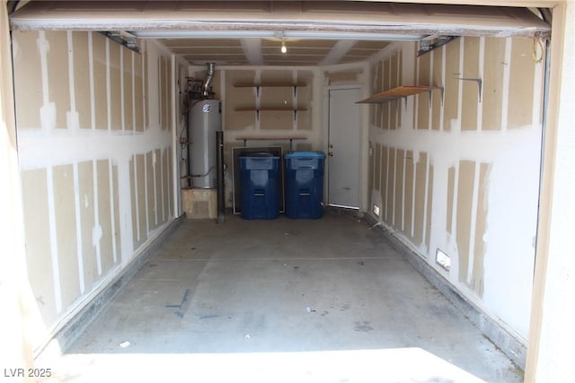 garage featuring gas water heater