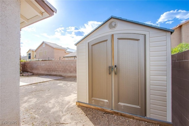 6274 Elderberry Wine Ave, Las Vegas, NV 89142 - view of shed featuring a fenced backyard