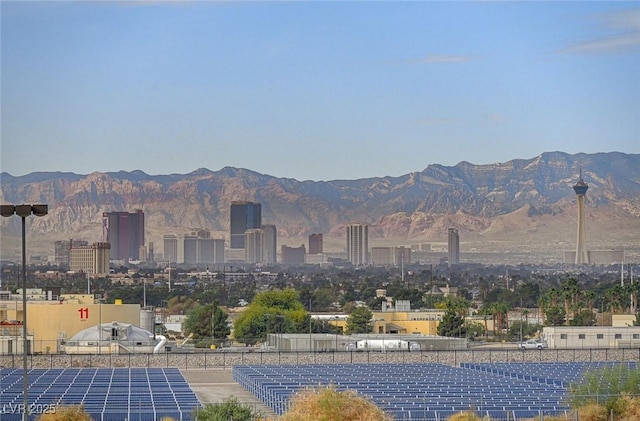 mountain view featuring nearby urban area