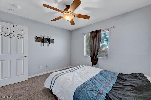 bedroom featuring carpet, baseboards, and a ceiling fan
